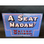 An unusual enamel chair back sign bearing the words: A Seat Madam? Walter Willson Ltd. with two