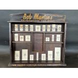 A counter-top dispensing cabinet for Bob Martin's Dog Powders, in very original condition, 23 1/2"