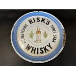A rare Risk's Whisky enamel advertising drink's tray, 12 1/4" diameter.