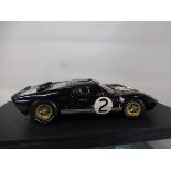 Two cased die-cast cars Racing Legends both Ford GT40 Mk.11.