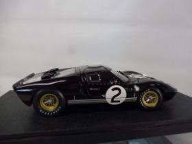 Two cased die-cast cars Racing Legends both Ford GT40 Mk.11.