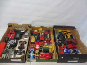 Three boes of boxed die-cast cars to include formula 1 racing cars.