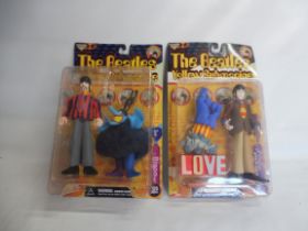 Two Mcfarlane toys Beatles Yellow Submarine figures, carded Paul Mcartney and Ringo.