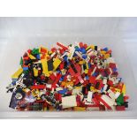 A quantity of loose Lego, appears 1970s and 1980s.
