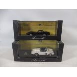 Two boxed Automobilia Dreams Engaged Series models Ford Mustang and 1964 Marcos.