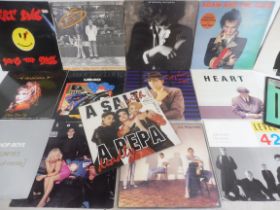 A box of mixed Genre Albulms To include The Jam ,Ian Drury Blondie and others