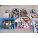 A huge quantity in seven boxes of railway layout accessories, buildings, scenery etc.