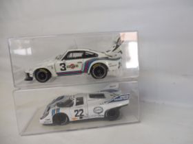 Two Universal Hobbies models - a Porsche 917 and a Porsche 913/935.