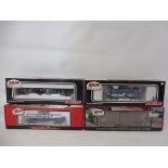 Atlas - four boxed pieces of rolling stock.