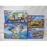 Four boxed Lego City sets, no.'s 60093, 60073, 60056 and 4432, not checked.