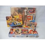 Four boxed Lego sets to include trainset, no. 116, Super Set, no. 088 etc. not checked.