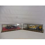 Two cased Midland Racing Models, a Renault RE20 Turbo Jean Pierre Jabouille signed, plus an Eagle