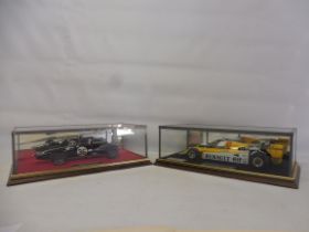 Two cased Midland Racing Models, a Renault RE20 Turbo Jean Pierre Jabouille signed, plus an Eagle