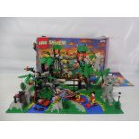 A boxed Lego Enchanted Island, no. 6278, not checked.