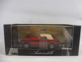 A boxed Automobilia Dreams Engaged Series model 1962-64 Cunningham C3, 034/159.