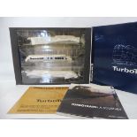 A boxed Rapido Trains TurboTrain, complete with manuals.
