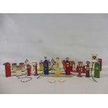 A large selection of die-cast and plastic petrol pumps, plus telephone box etc.