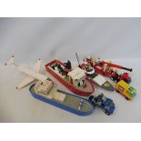 A selection of 1980s and later Lego vehicles and figures.