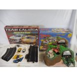 A Scalextic Team Calibra racing set and a boxed Tracey Island boxed Thuderbirds set.