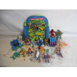 A large quantity of Teenage Mutant Ninga Turtles, various characters.