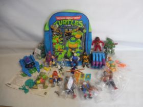 A large quantity of Teenage Mutant Ninga Turtles, various characters.