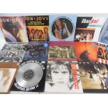 A box of rock LPs to include a large selection of Bon Jovi and Status Quo and others, approx. 35