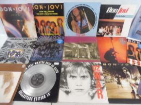 A box of rock LPs to include a large selection of Bon Jovi and Status Quo and others, approx. 35