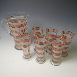 A retro glass Lemonade Set, comprising a Jug and six Glasses, decorated with coloured bands, H 25cm,