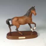 A Royal Doulton pottery figure 'Spirit of the Wind', on wooden plinth with name plaque, H 25cm,