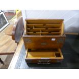 An Edwardian oak Stationery Box, with front pull lower drawer operating rotating top letter rack,