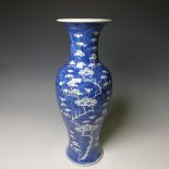 A late 19thC Chinese porcelain blue and white Vase, decorated with prunus blossom, 36cm high.