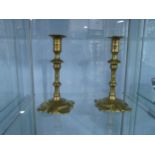 A pair of George III brass Candlesticks, in the manner of William Lee of Birmingham, with lobed
