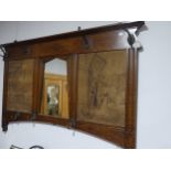 An early 20thC Arts and crafts style oak Hall Mirror with hooks and tapestry panels, W 125cm x H