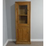 An early 20thC pine glazed Larder Cabinet, W 65cm x H 188cm x D 28cm.
