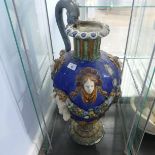 A 19thC Italian faience majolica Renaissance style pottery twin-handled Urn, applied in relief