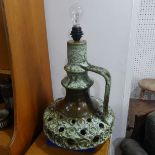 A West German pottery fat lava Lamp Base, of mottled green ground, pierced knop with handle,
