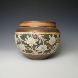 A Royal Doulton stoneware Jardiniere, with raised foliate decoration, impressed marks to base,