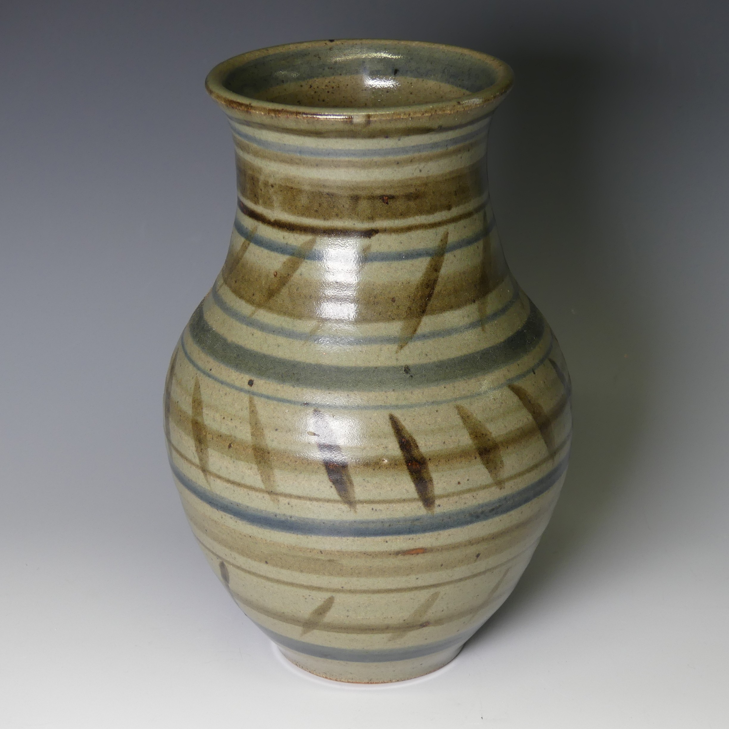 A William Ruscoe studio pottery baluster Vase, decorated in brown and blue banding, with signature
