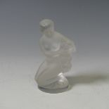 A Lalique frosted glass figure of a Nude with Goat, with stamped mark to base, H 12cm.