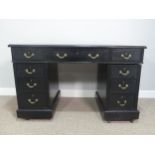 An Edwardian pine twin Pedestal Desk, with red tooled leather top, with three frieze drawers below