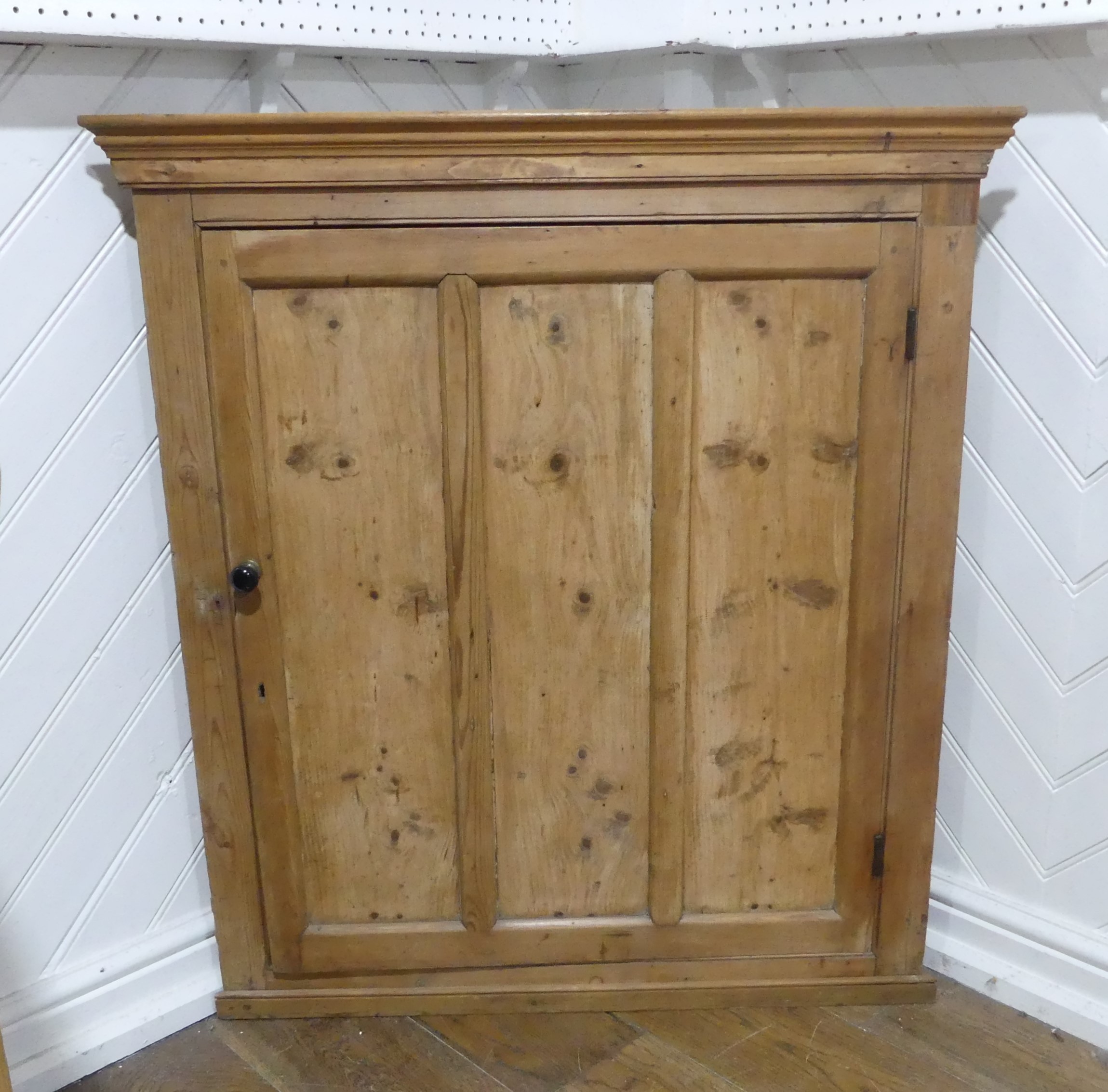 A 20thC pine Corner Cupboard, made up from two corner cupboards stack on the other, W 98cm x H 203.