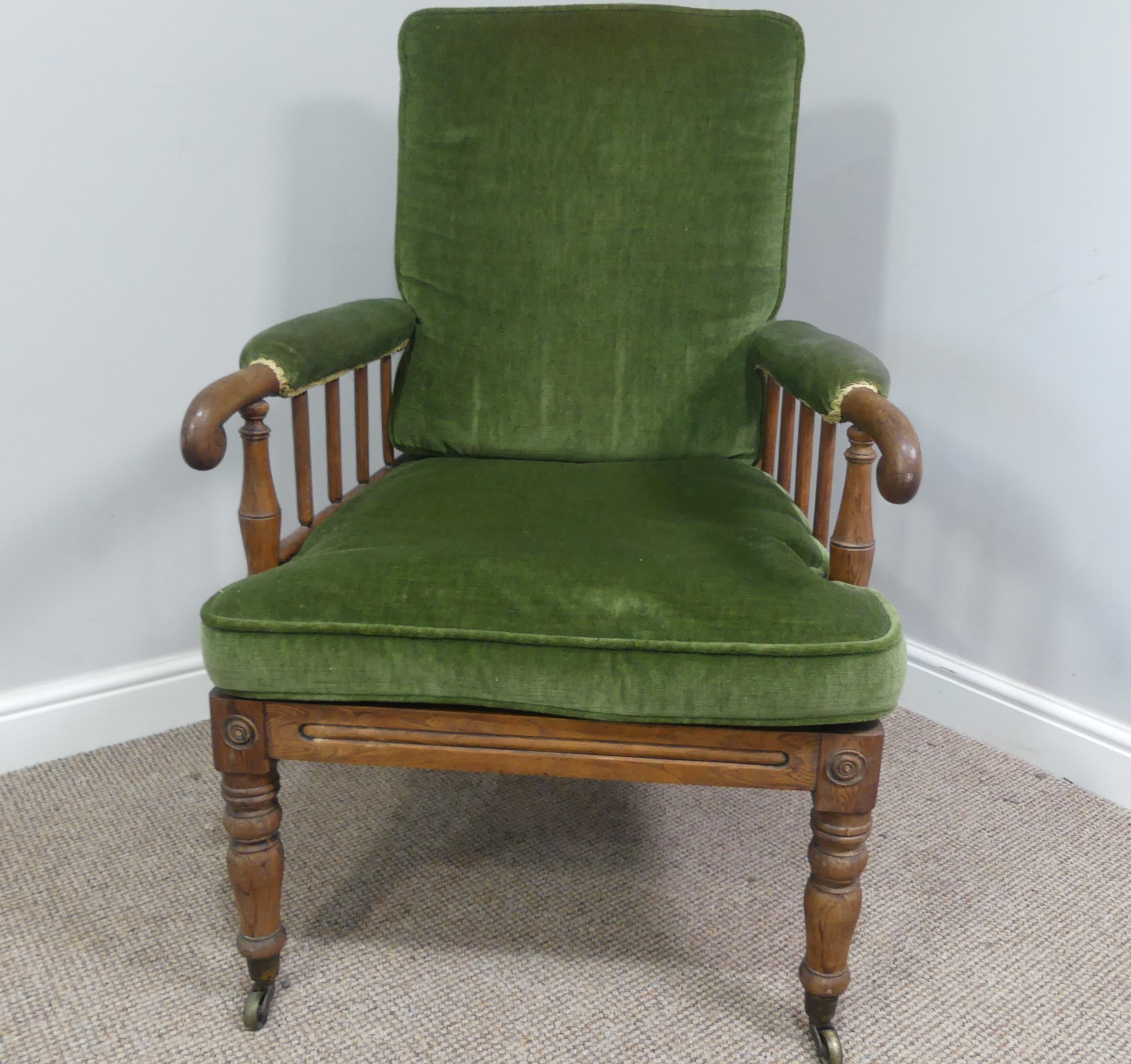 A Victorian pitch pine framed Armchair, with stick back and scroll arms, upholstered green armrests, - Bild 2 aus 15