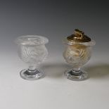 A Lalique frosted glass Lion's Head Table Lighter and Cigarette Pot, each with corresponding design,