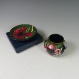 A Moorcroft Anemone Tribute Pin Dish, 12cm diameter, boxed and with card outer sleeve, and a small