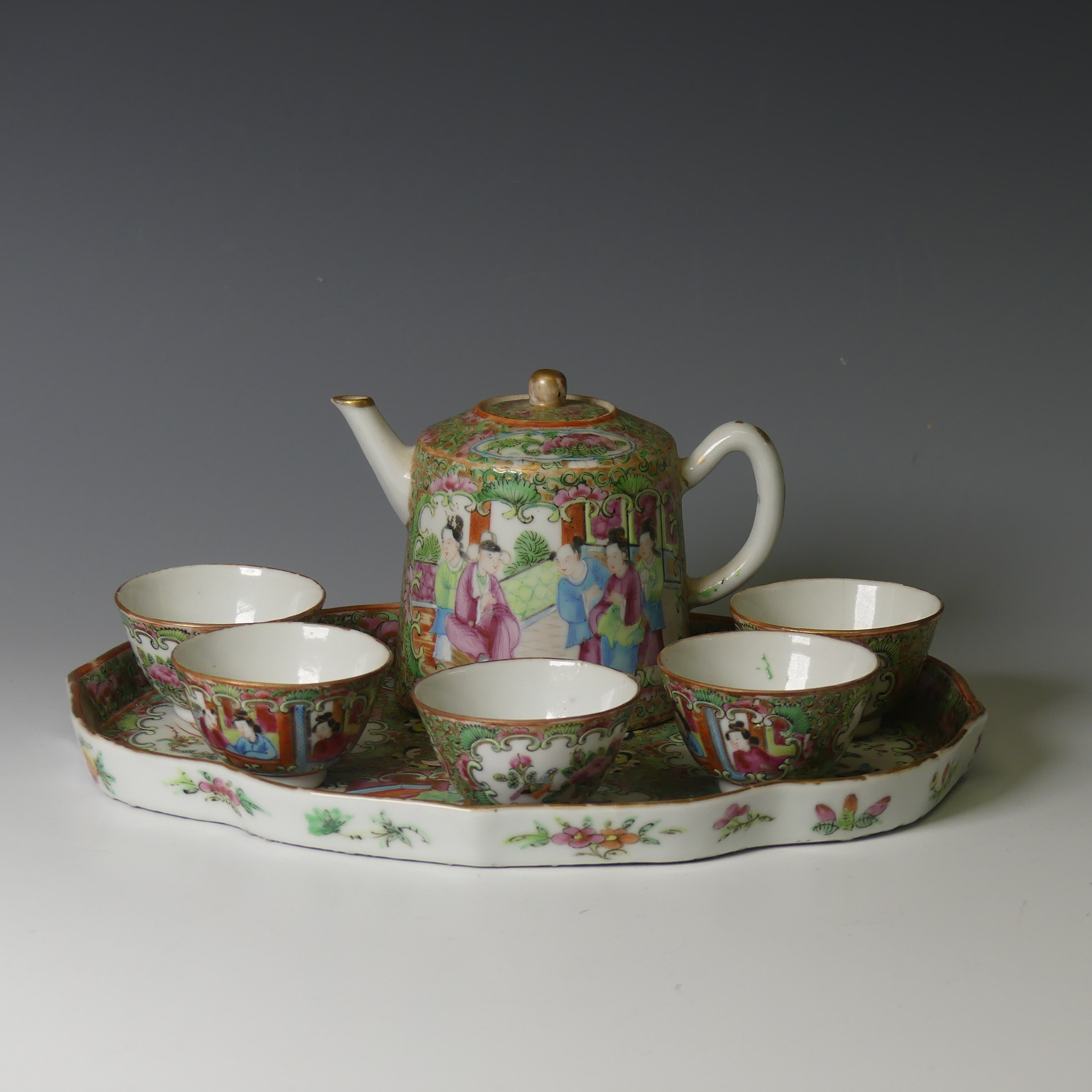 A 19thC Chinese famille rose minature Tea Set, comprising Tea Tray, L 26cm x W 19cm, Teapot and five
