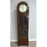 A 1930's oak cased Westminster chiming Longcase Clock, with silvered dial and Arabic chapter ring,