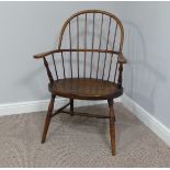A late 19th century ash and elm Windsor Chair, with stick back and shaped seat, on turned legs
