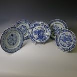 A near pair of 19thC Chinese blue and white Plates, with underglaze floral decoration and floral