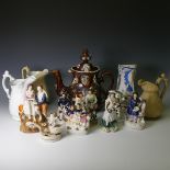 A large Victorian Bargeware Teapot, decorated in typical style, together with a Meigh & Sons Jug,