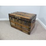 A Victorian metal bound dome-topped Trunk, with leather carrying handles, W 92cm x D 52cm x H 65cm.